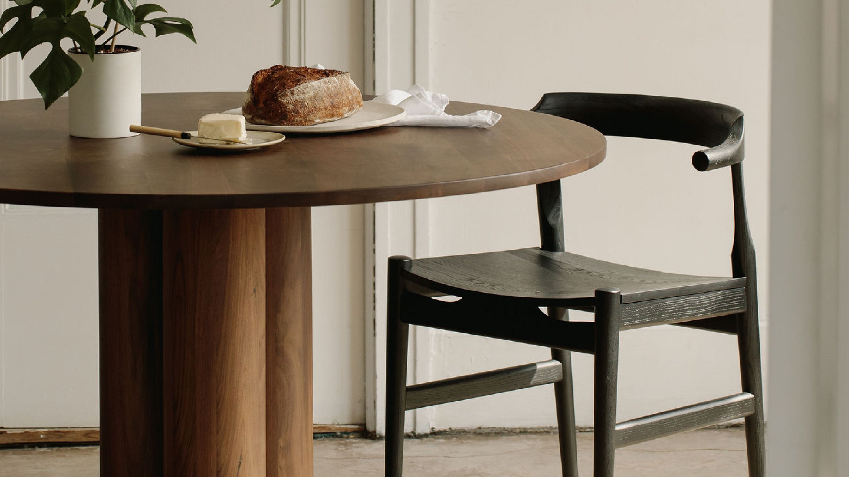 Dining table with tuck store in chairs